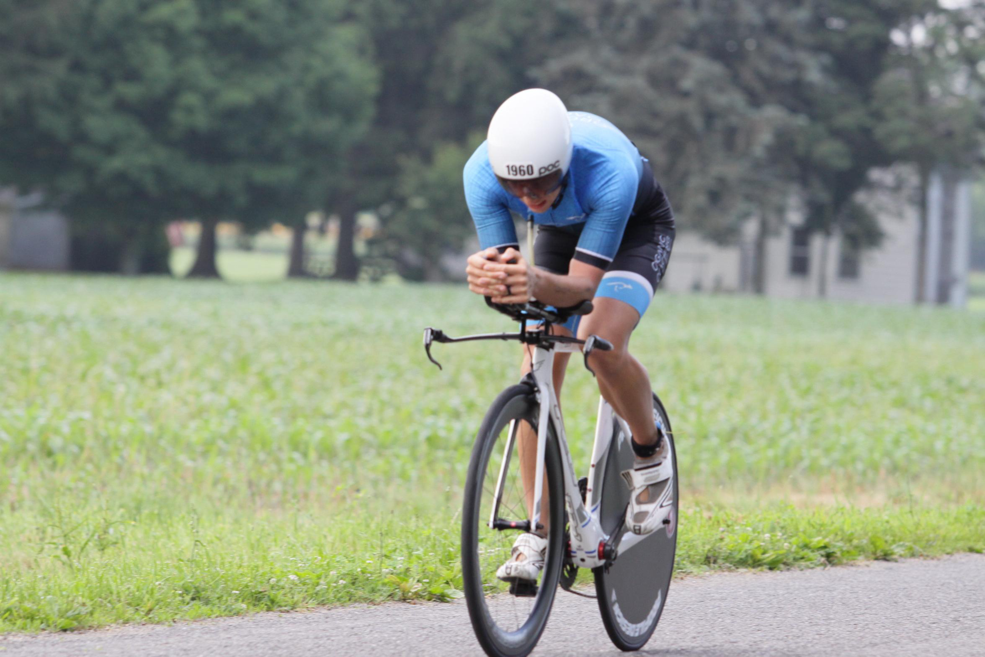 Man riding triathlon bike