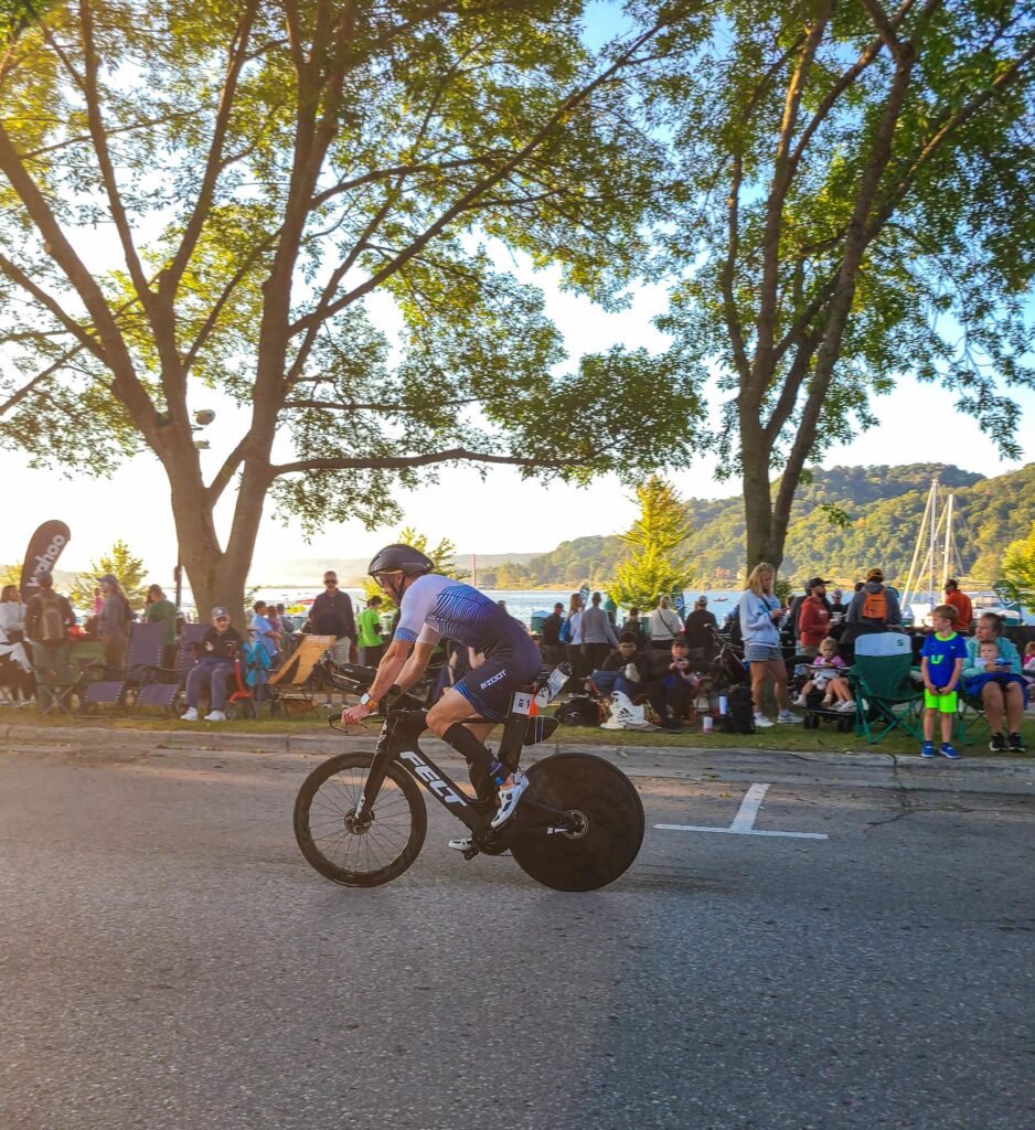 man riding triathlon bike