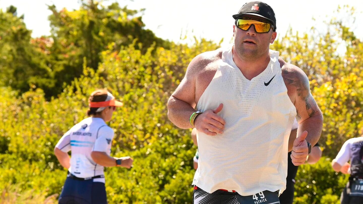man running in a triathlon